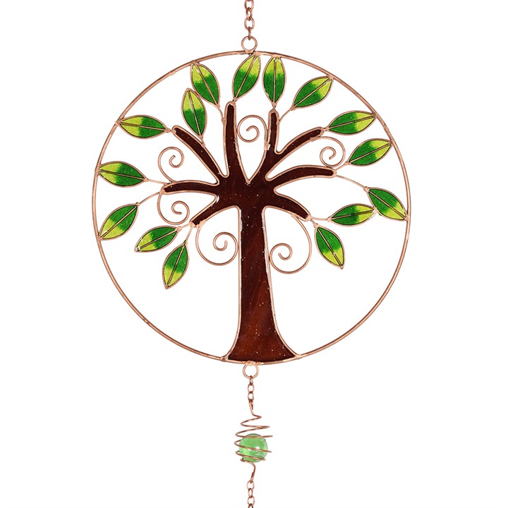 Decorative tree-shaped ornament with green leaves on a white background