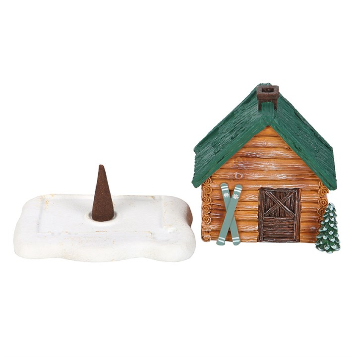Small log cabin figurine with skis and a cone on a white background