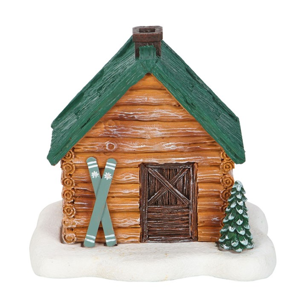 Log cabin ornament with green roof, skis, and a small tree on a white background