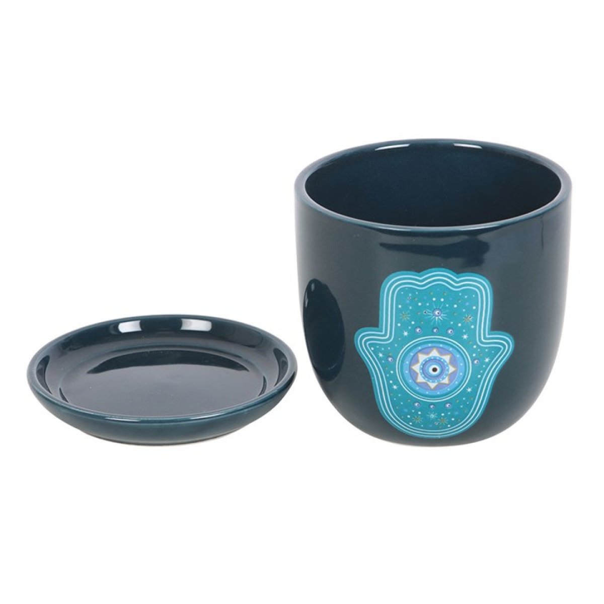 Blue ceramic mug with Hamsa design on a white background