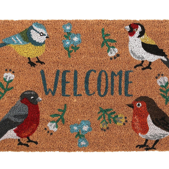 Doormat with birds and flowers design and the word 'WELCOME'.