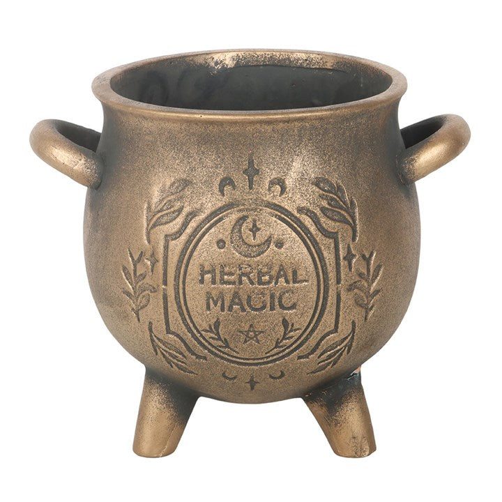 Bronze cauldron with 'Herbal Magic' engraving on a white background