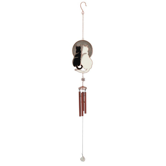 Decorative wind chime with cat design on a white background