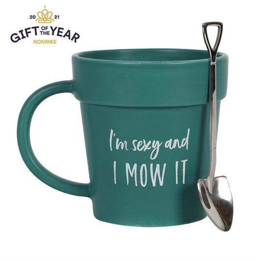 Teal mug with 'I'm sexy and I MOW IT' text and a spoon, with 'Gift of the Year Nominee' badge.
