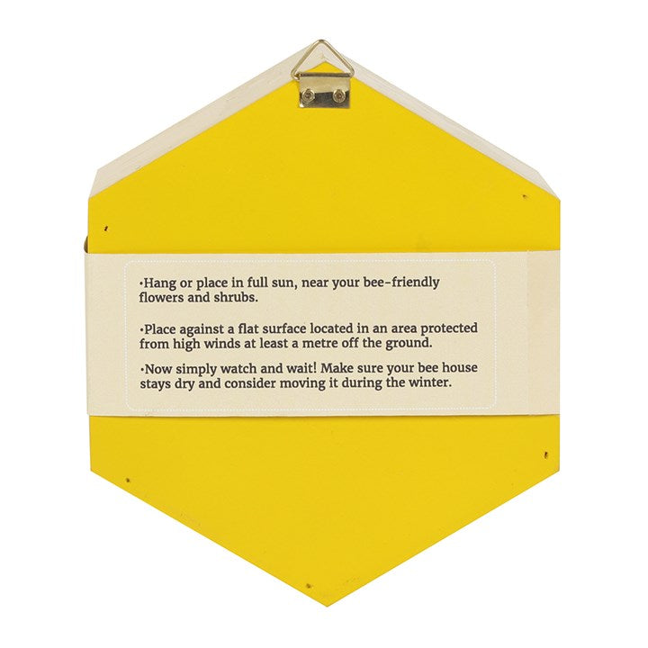 Yellow bee house with instructions on a white background