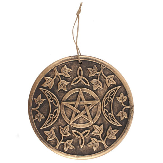 Decorative pendant with pentagram and moon design on a white background
