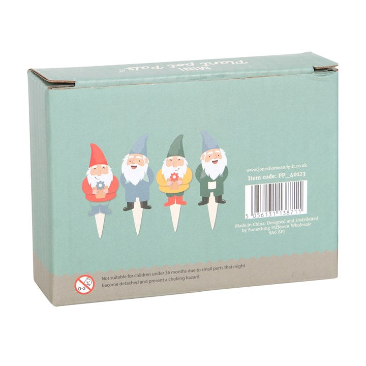 Box packaging with cartoon gnomes on a light blue background