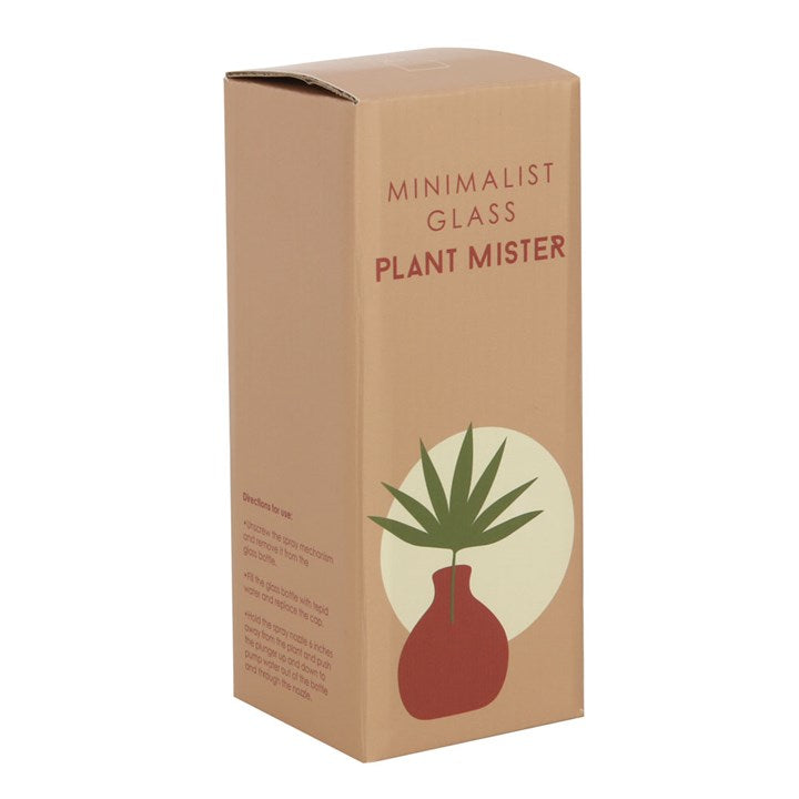 Cardboard box packaging for a minimalist glass plant mister on a white background