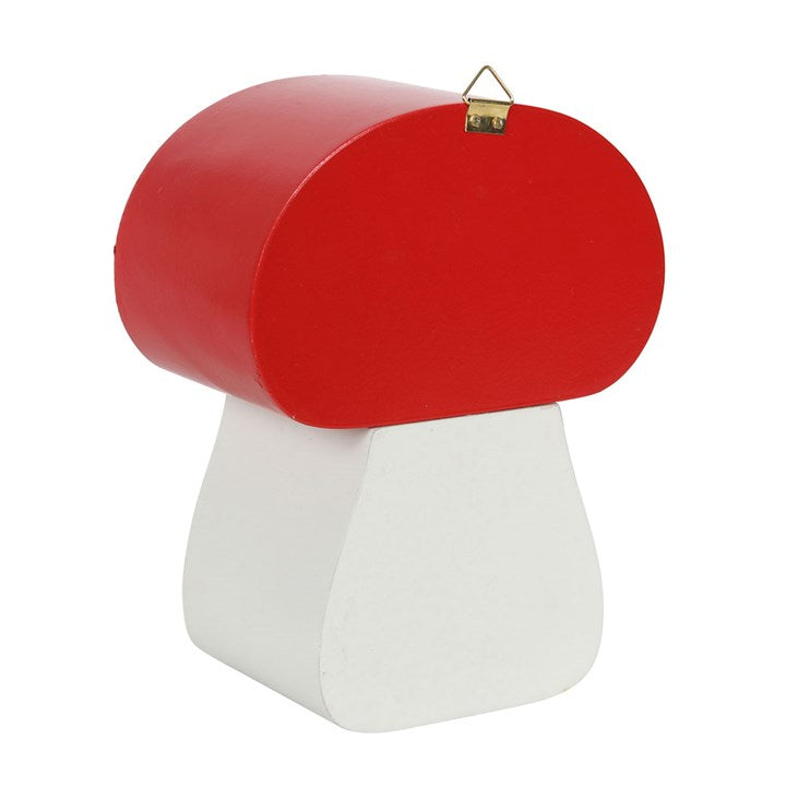 Red and white mushroom-shaped object on a white background