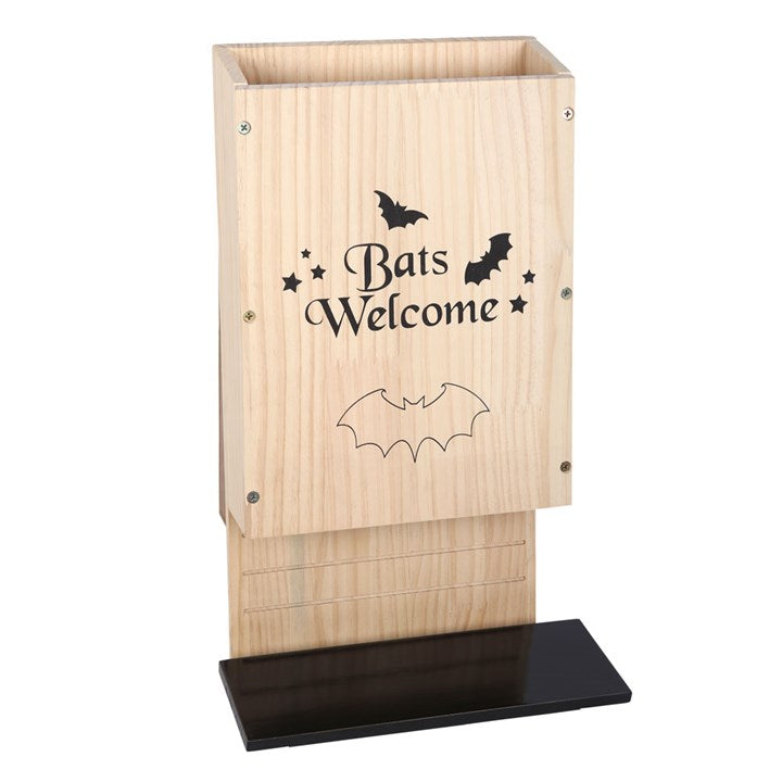 Wooden bat house with 'Bats Welcome' text and bat illustrations on a white background