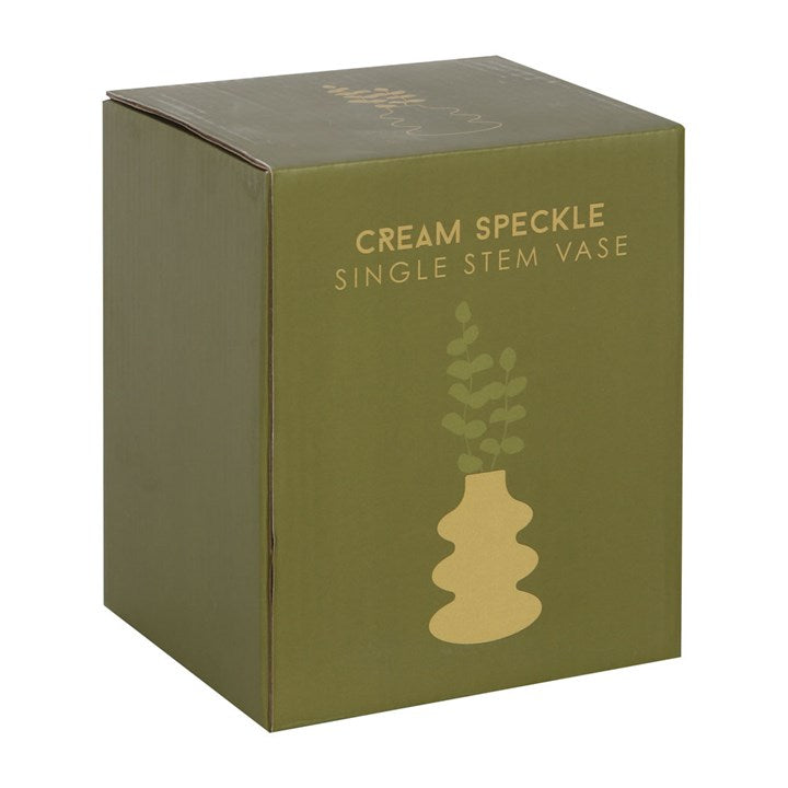 Green box packaging for a 'Cream Speckle Single Stem Vase' with a gold vase illustration on a white background.