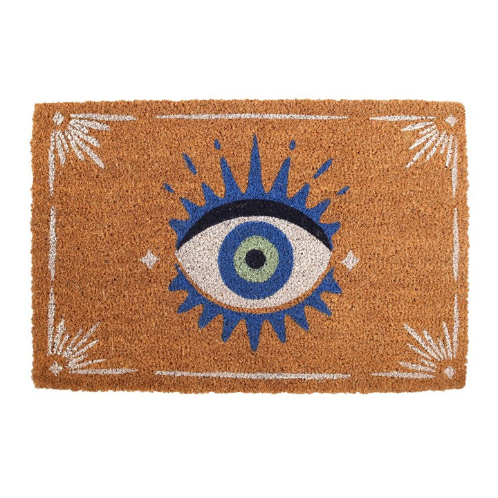 Doormat with eye design on a brown background
