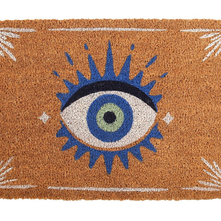 Doormat with eye design on a brown background