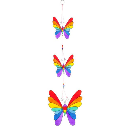 Three colorful butterfly suncatcher hanging against a white background