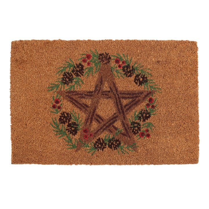 Doormat with a pentagram design surrounded by foliage and pinecones on a white background