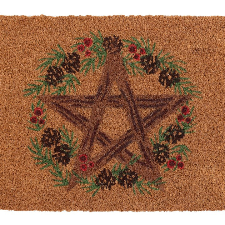 Doormat with a star design surrounded by pinecones and flowers on a brown background