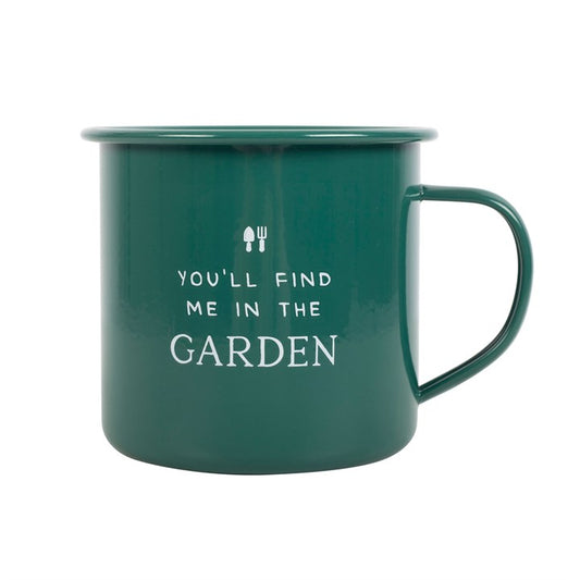 Green mug with 'You'll find me in the garden' text on a white background