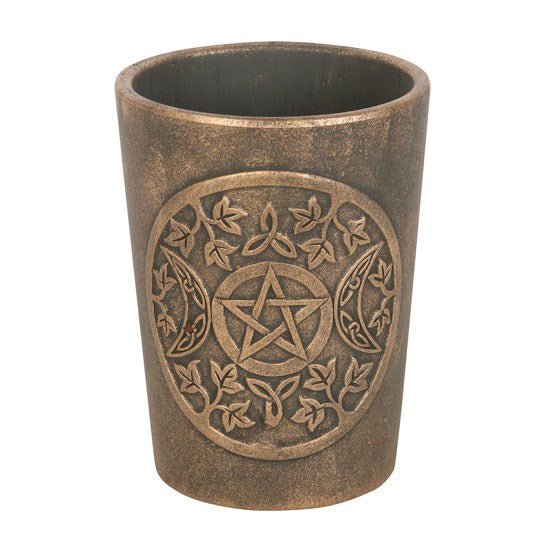 Ceramic pot with pentagram design on a white background