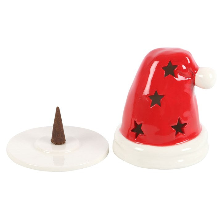 Red hat-shaped incense burner with star designs on a white background