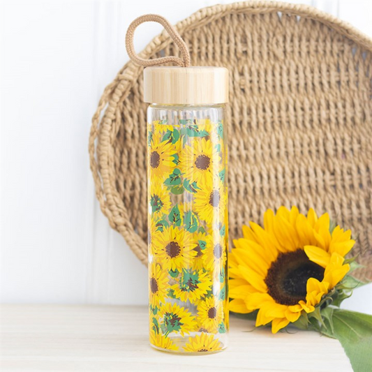 Sunflower print glass water bottle with a bamboo lid.