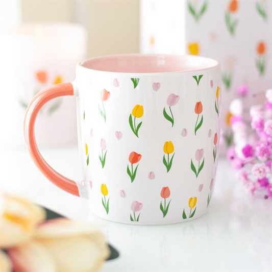 Mug with floral pattern on a blurred background