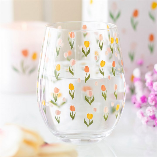 Clear glass with floral pattern on a light background